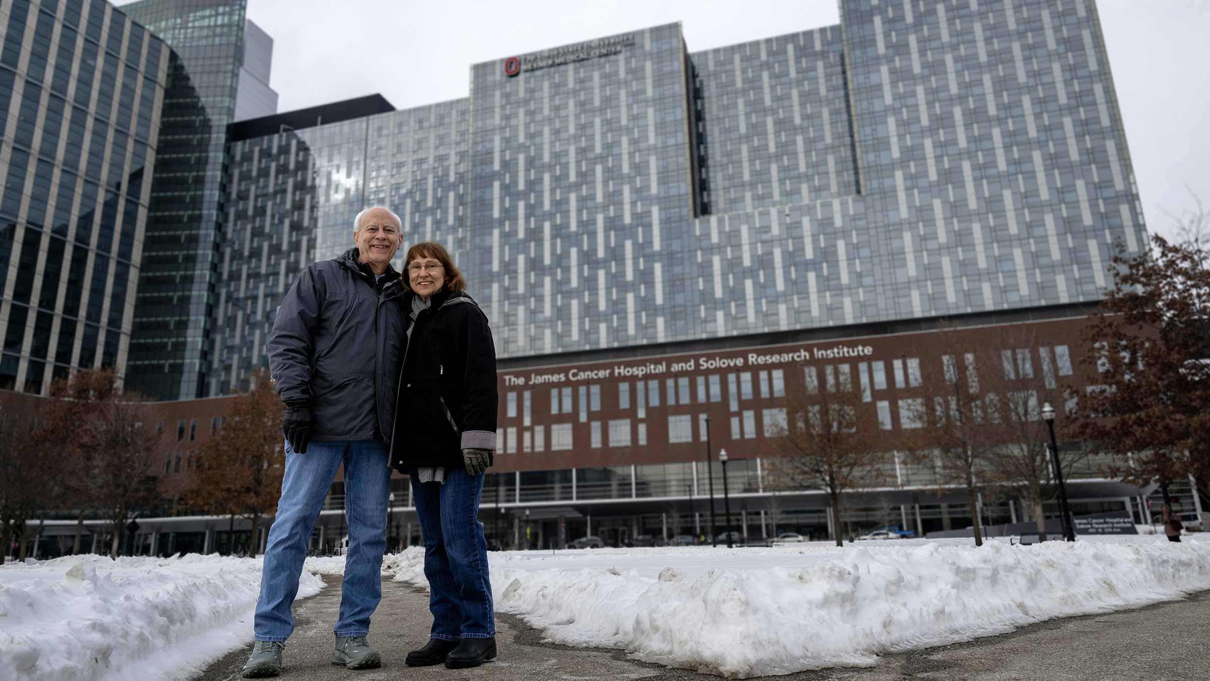 James proton therapy patient, Jim DiConstanzo and his wife pose in front of the James Cancer Hospital