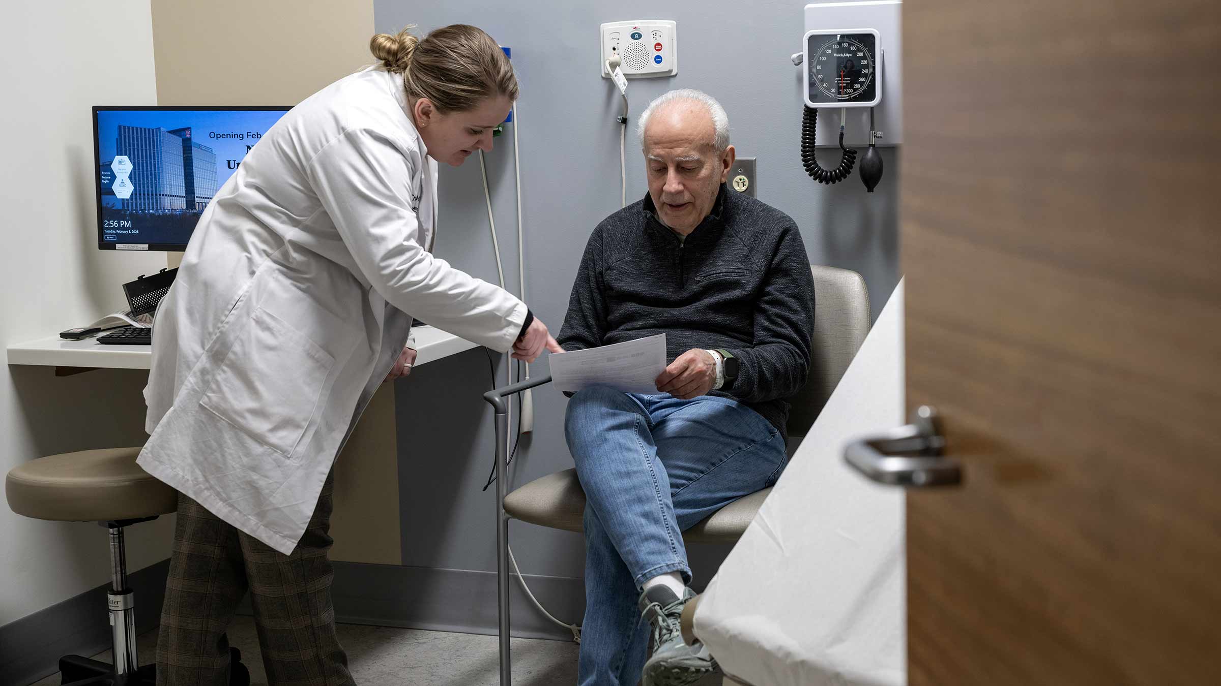 Nurse practitioner talking to a patient