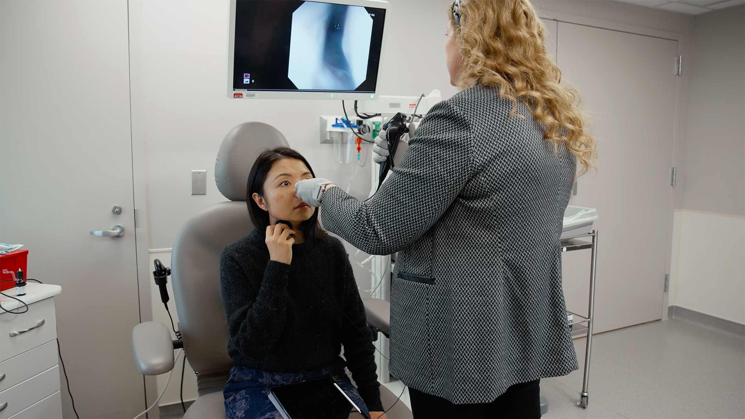 Speech language pathologist working with a patient