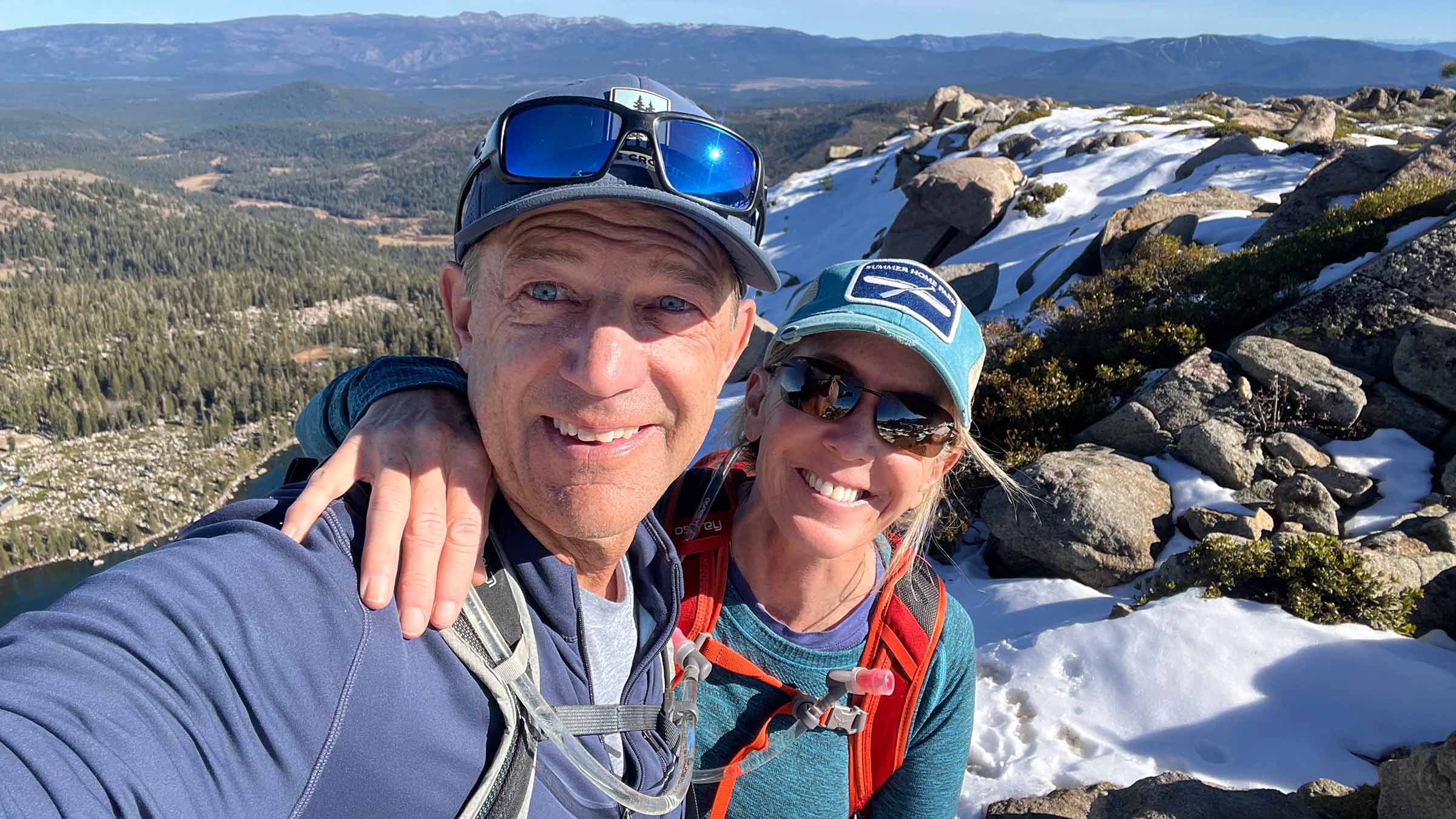 Patient, Laura Kindelt, with her husband in the mountains