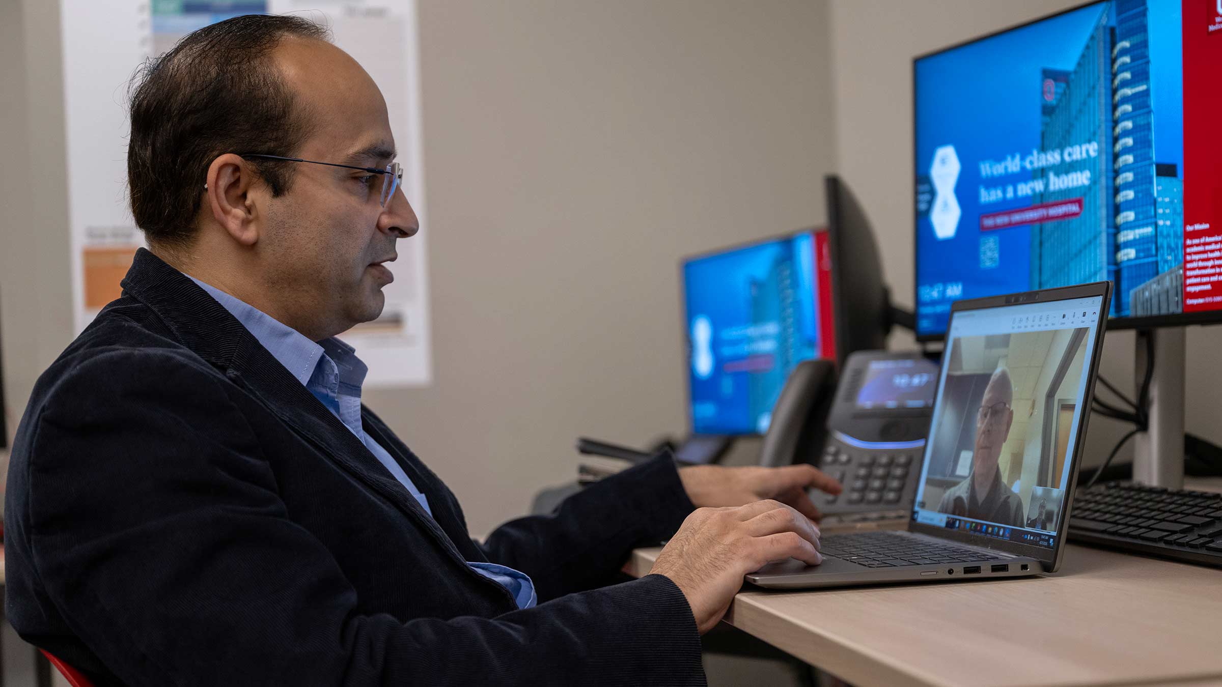Deepak Gulati, MD, at a computer