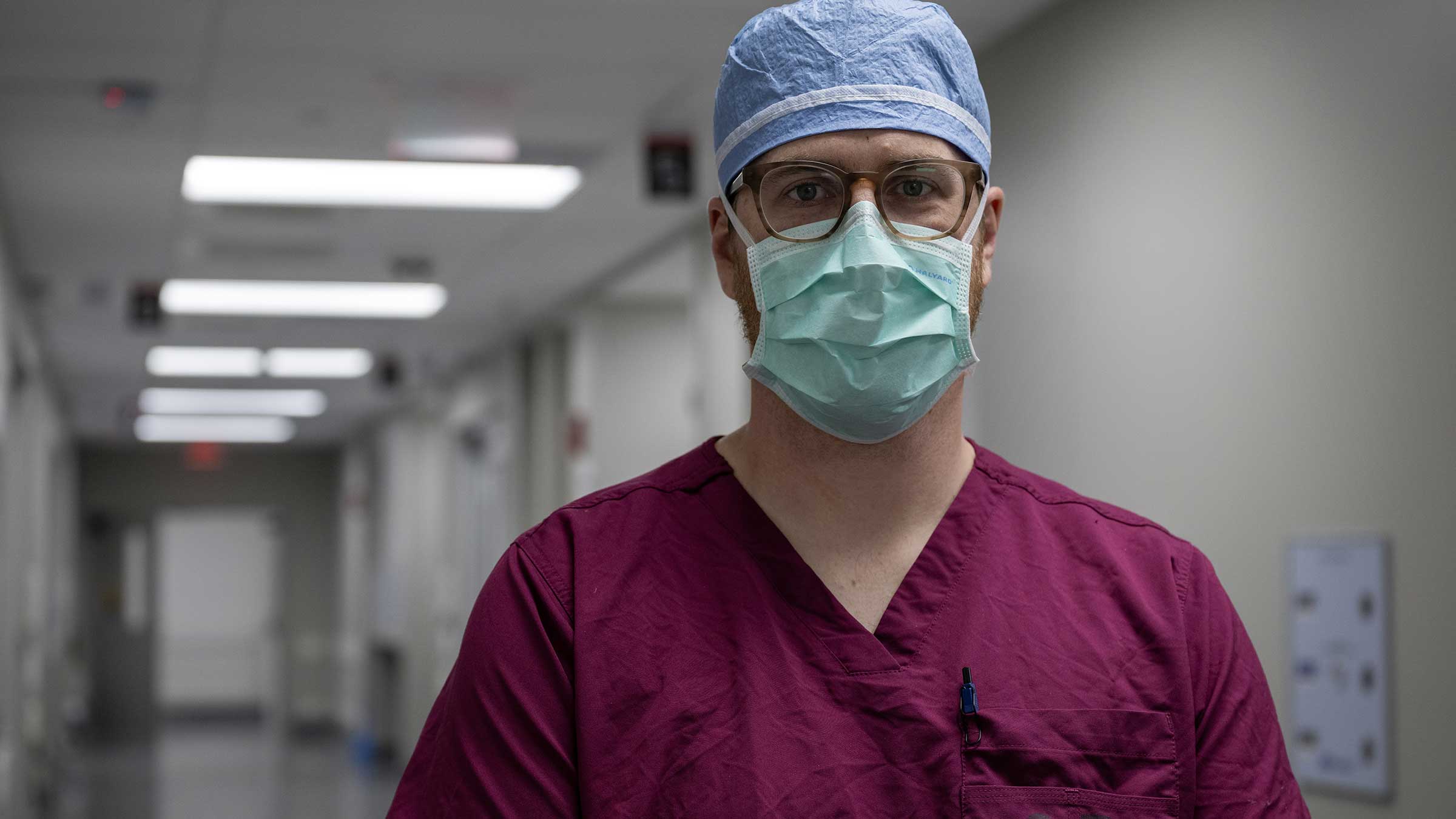 Patrick Sweigert, MD, wearing scrubs