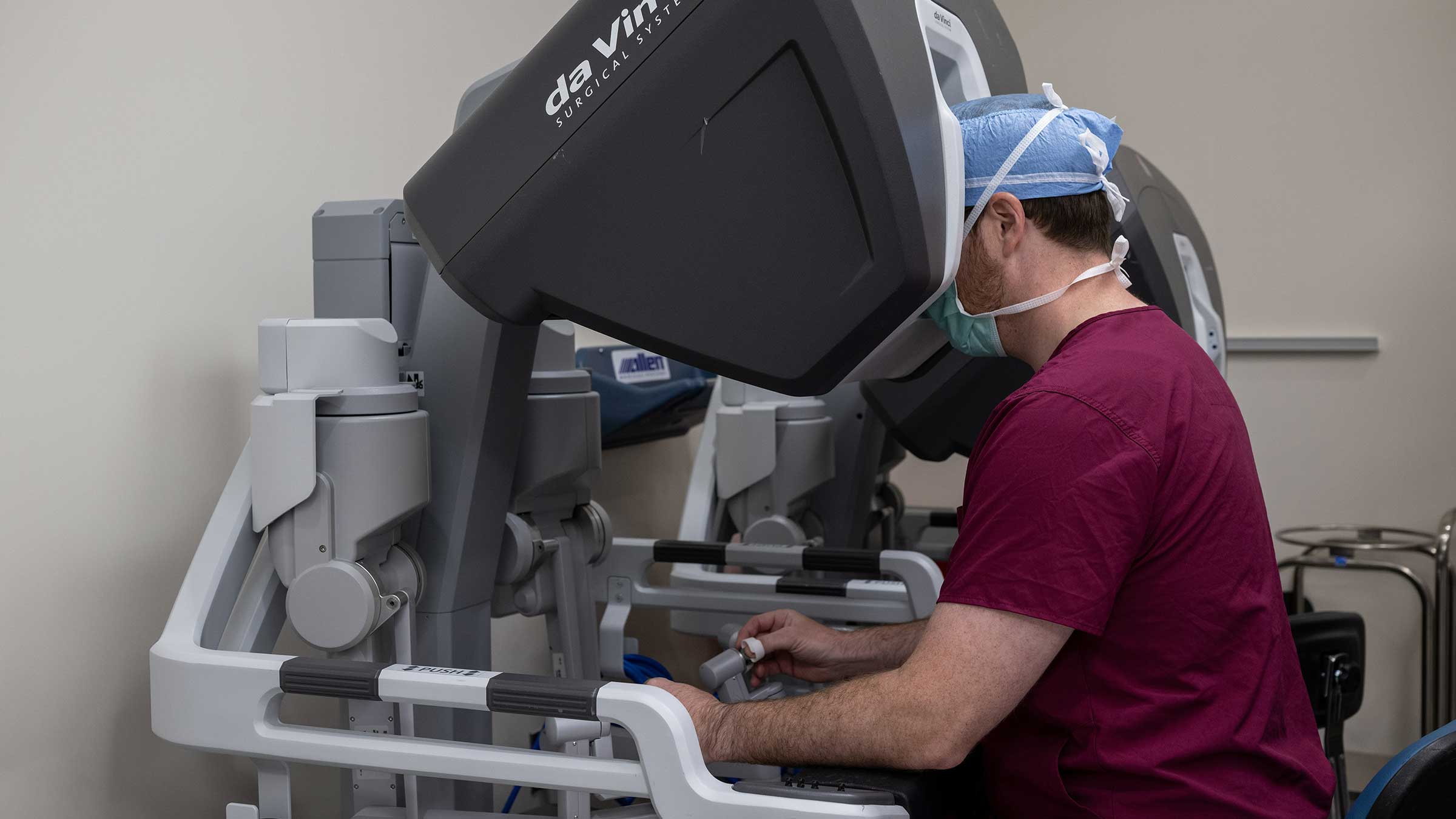Patrick Sweigert, MD, performing robotic surgery