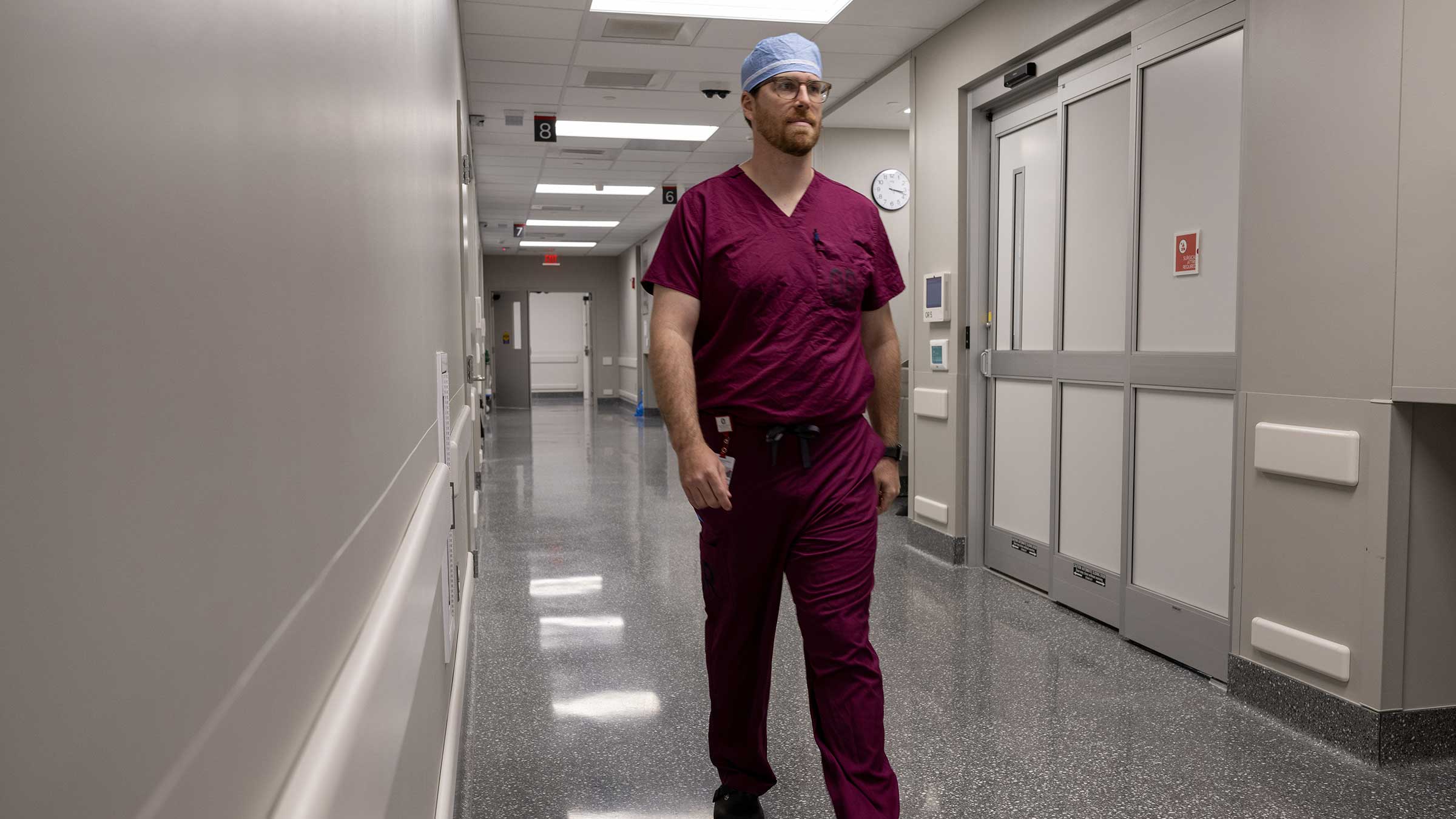 Patrick Sweigert, MD, walking down the hallway