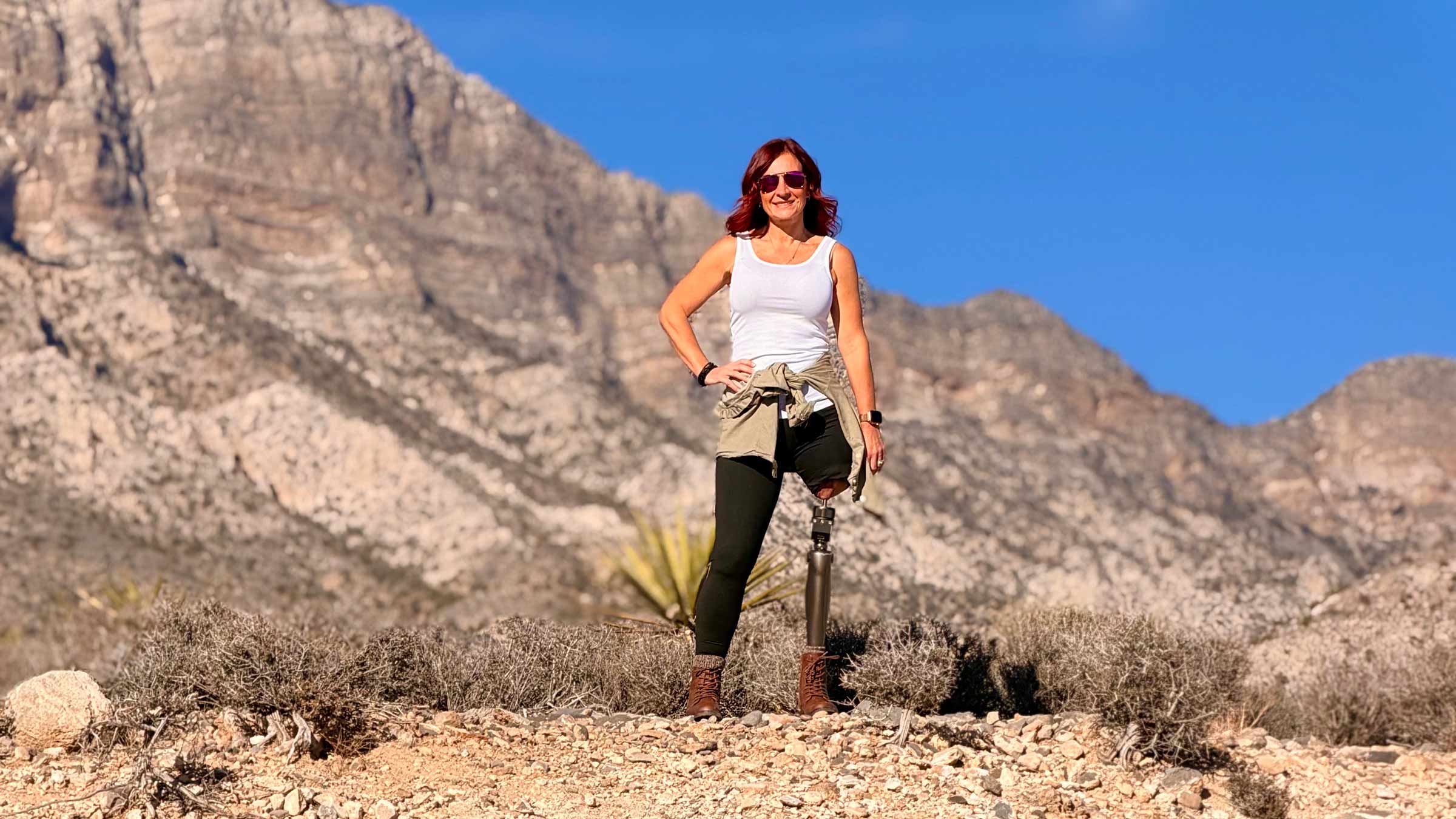 Stacey Finley hiking in a park