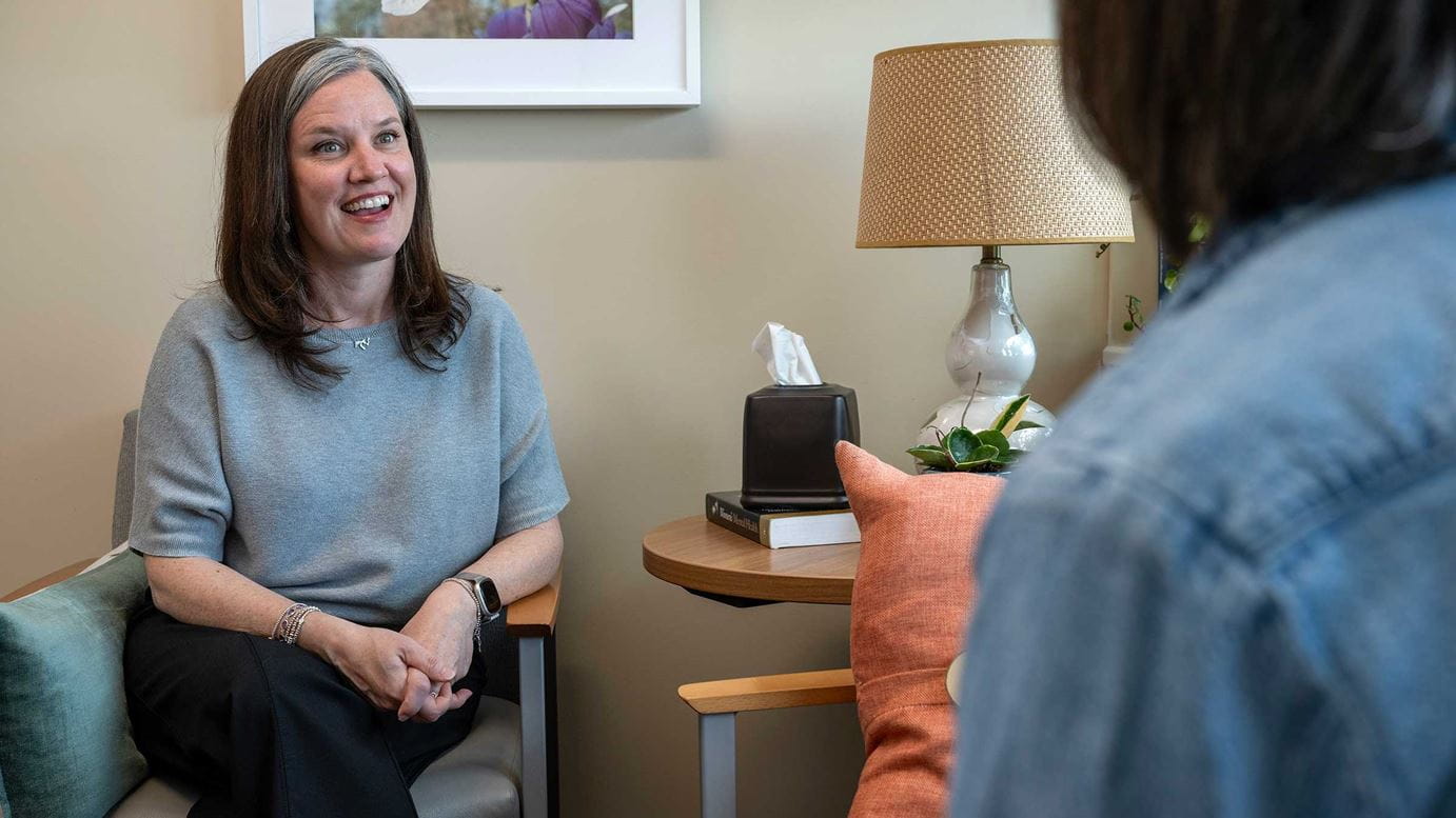 Dr. Carpenter talking to a patient