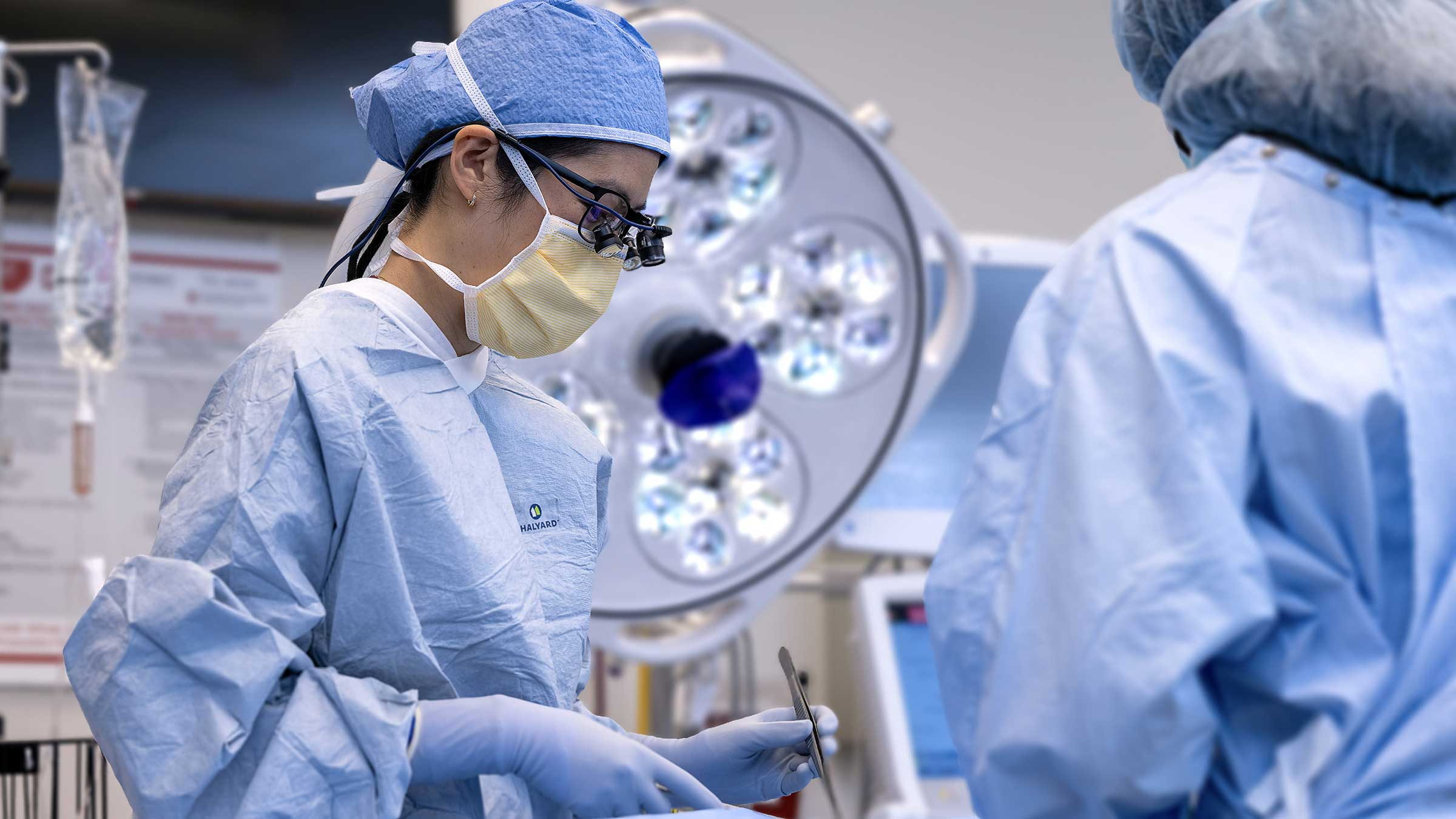 Dr. Lu performing a surgery