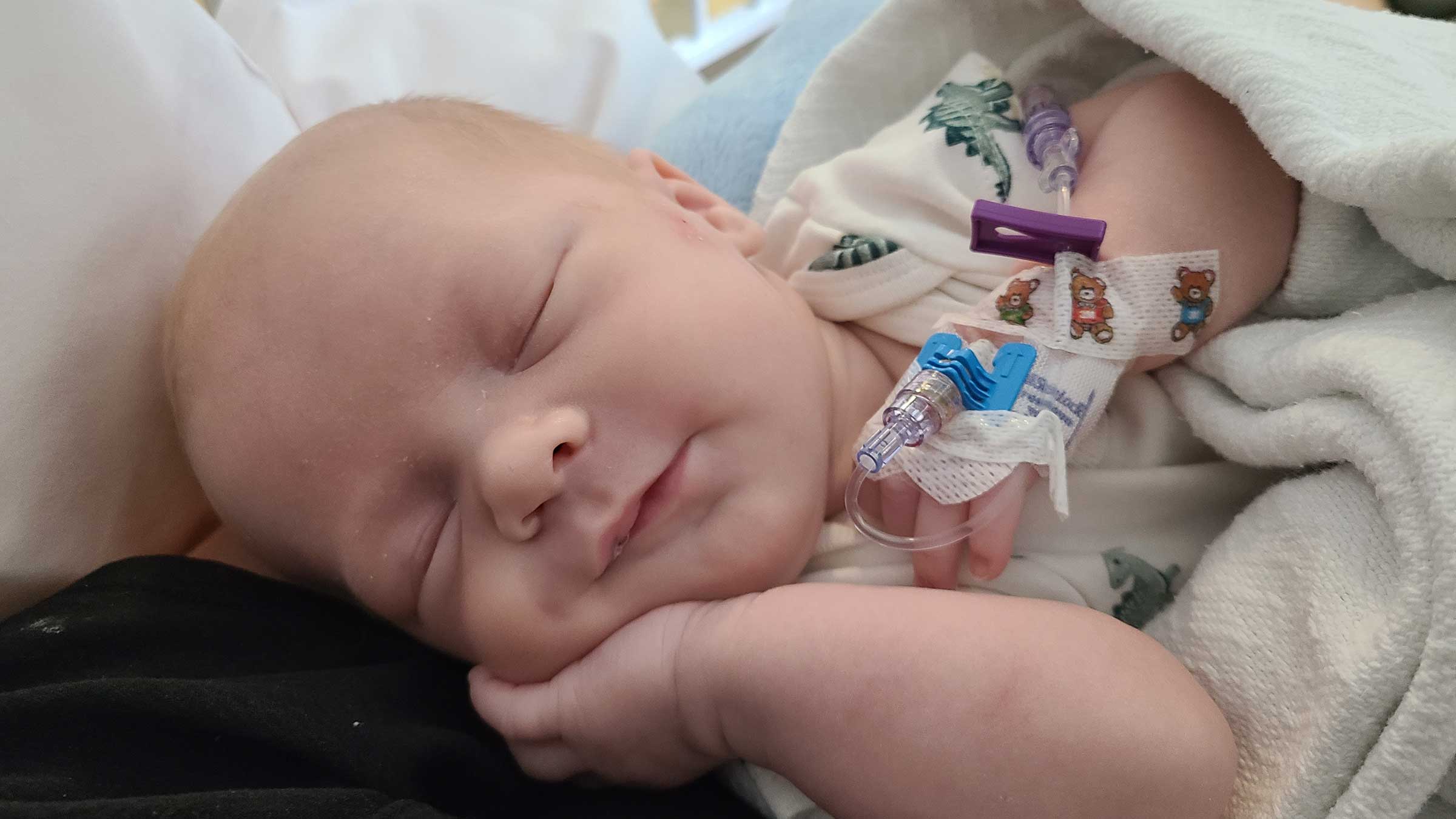 Isaiah sleeping in the NICU